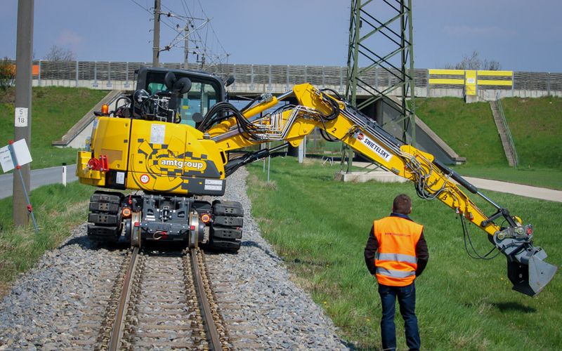 Track maintenance machine at work